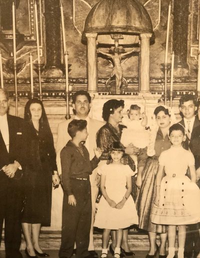 Orqui’s baptism at Jesus del Monte Catholic Church with her parents, Starr and other family members