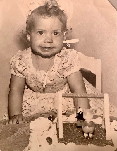 Orqui with her first birthday cake